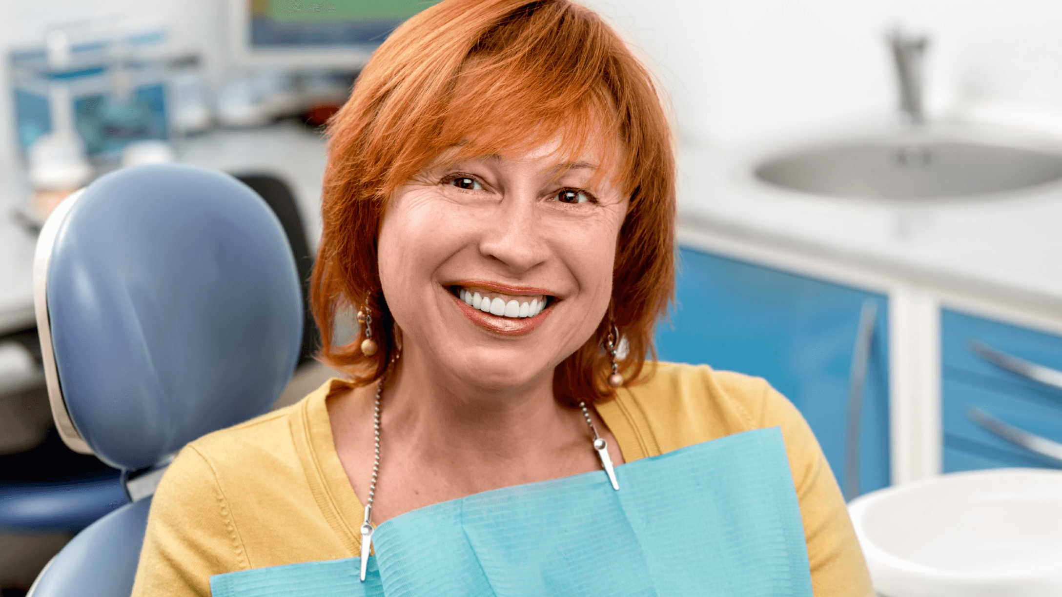 woman at dentist smiling